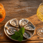 aperol st germain spritz verres huîtres table bois